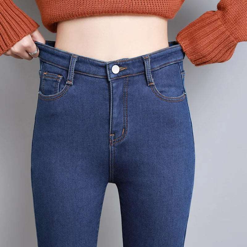 New Women Thermal Jeans Winter Snow Warm Plush Stretch Jeans Lady Skinny Thicken Students Denim Pants Fleece Mom Fur Trousers.